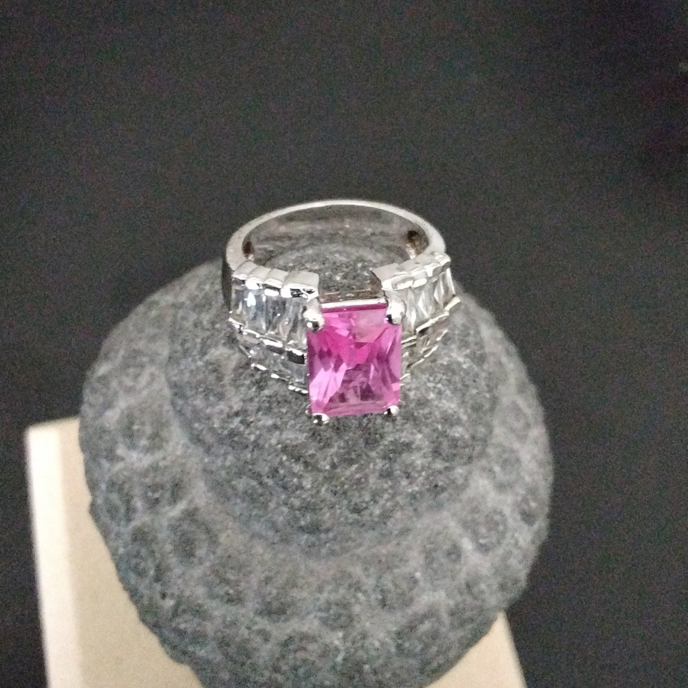 Sterling Silver Ring with Emerald Cut Pink Center Stone,with White Baguettes.